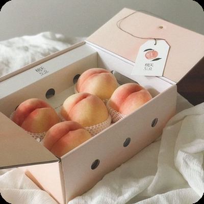 Japanese white peaches in a box